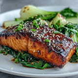 Savory baked salmon and vibrant sesame bok choy, ready for dinner.